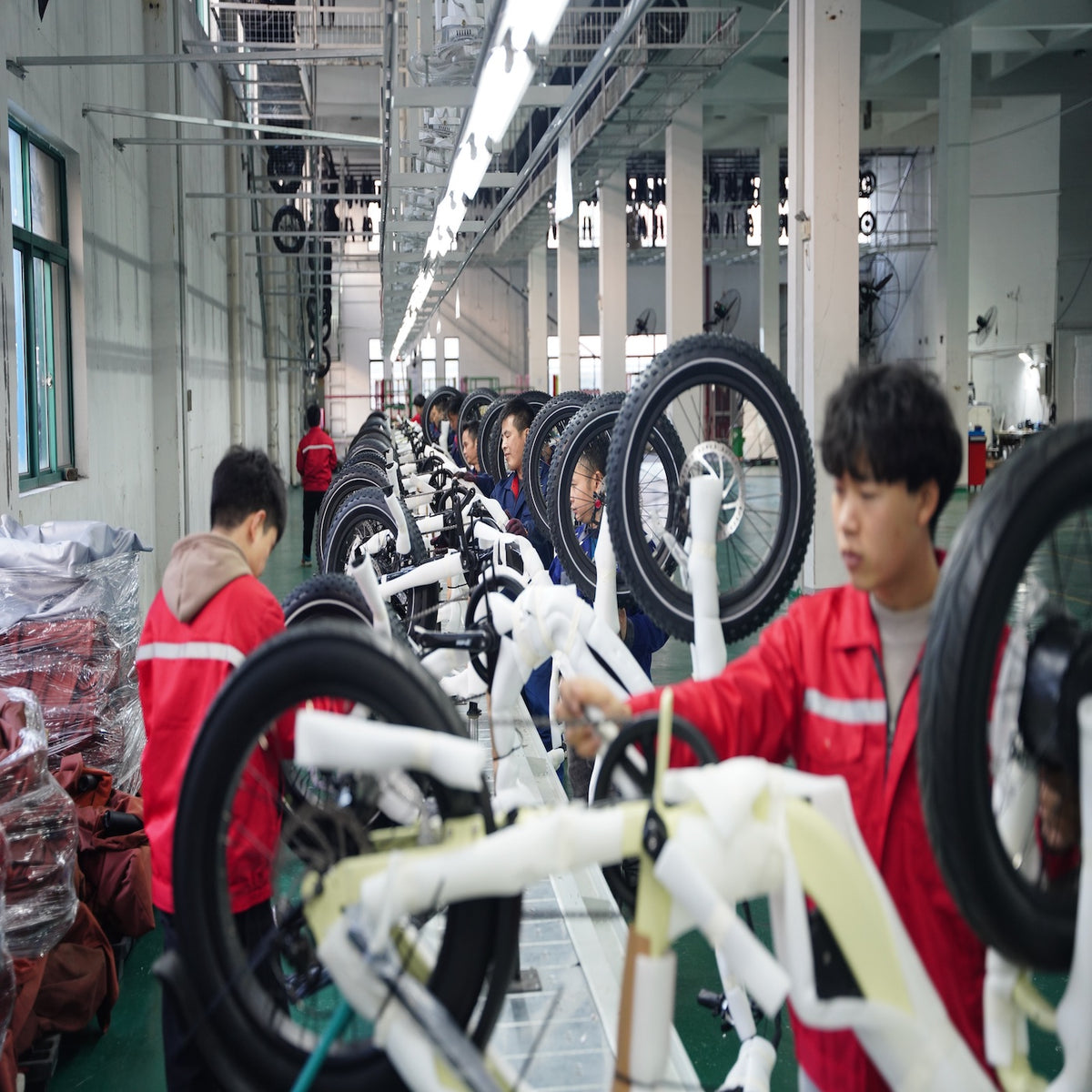 workers on ebike assemble line